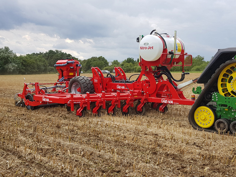 HE-VA Evolution OSR Seeder behind a John Deere 8RX tractor