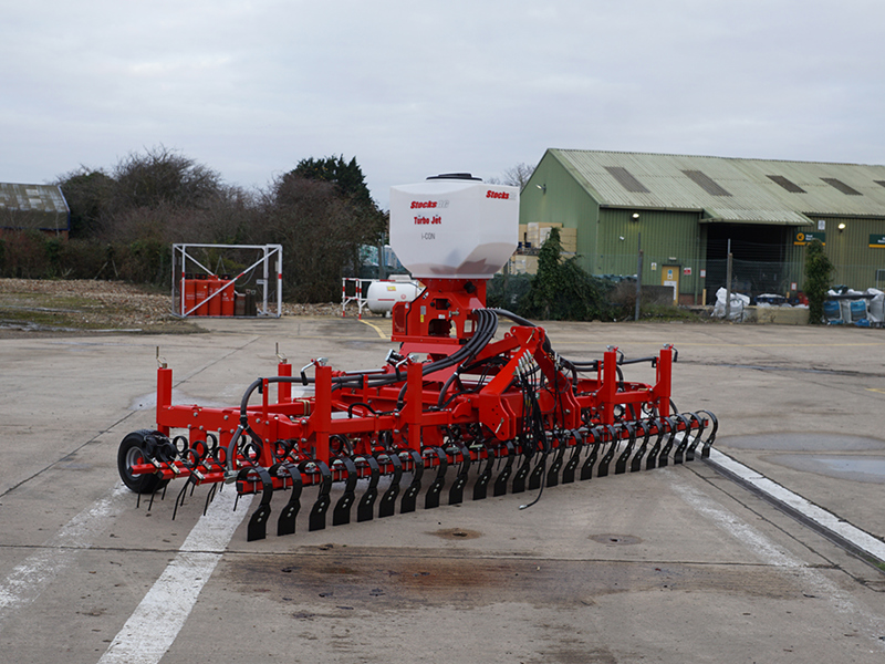 Yard image of front of HE-VA Grass Combi fitted with Stocks Ag Turbo Jet 8 Applicator